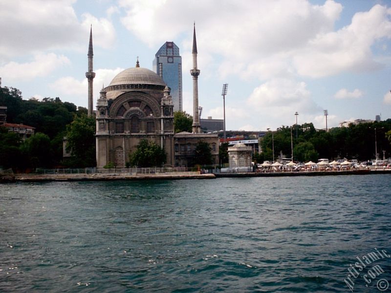 View of Dolmabahce coast and Valide Sultan Mosque from the Bosphorus in Istanbul city of Turkey.
