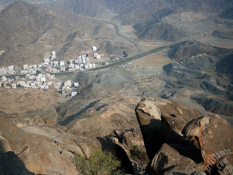 A picture of surrounding mounts and the city taken while climbing the Mount Savr in Mecca city of Saudi Arabia.
